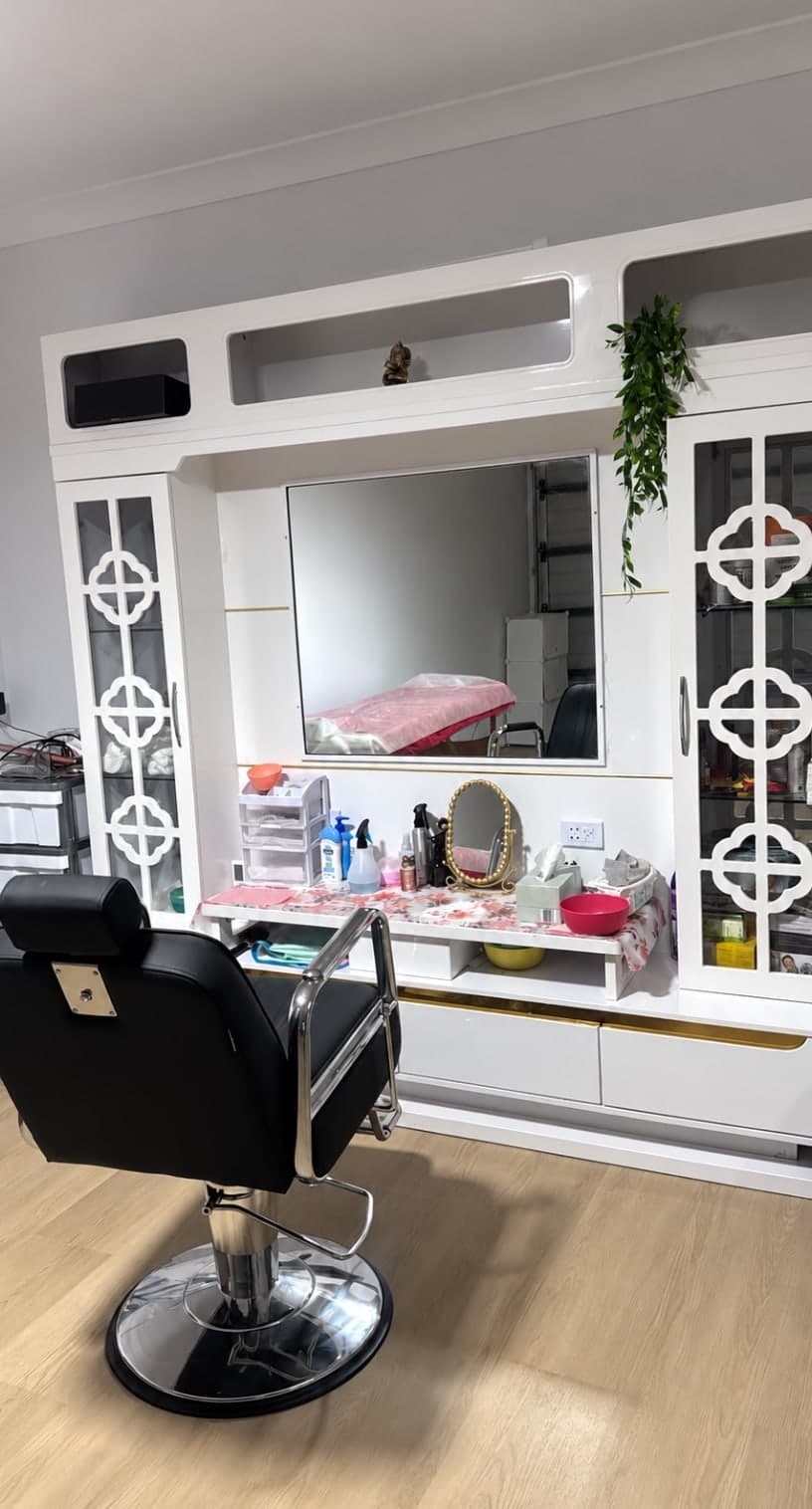 The vanity and styling station at Enrich Beauty Salon